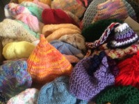 Newborn and preemie hats for babies at the Newton Wellesley Hospital. Knitted by the MIL Stitchers, the Morse Institute Library's community-oriented knitting and crocheting group.