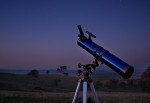 telescope looking at the night sky